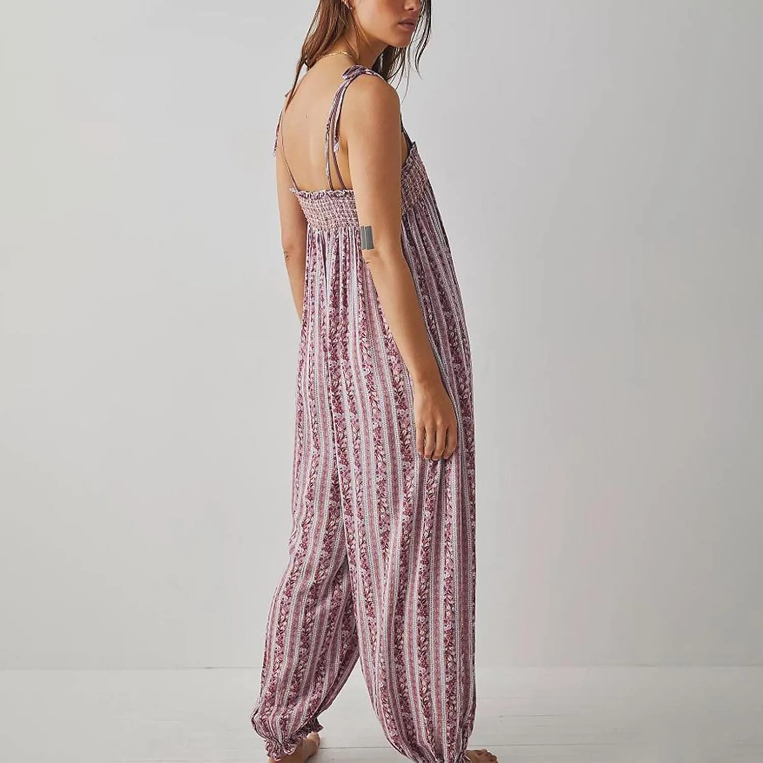 Faretumiya Women Spaghetti Strap Maxi Romper Sleeveless Loose Jumpsuits Floral Smocked Baggy Long Pant Beach Boho Jumpsuit