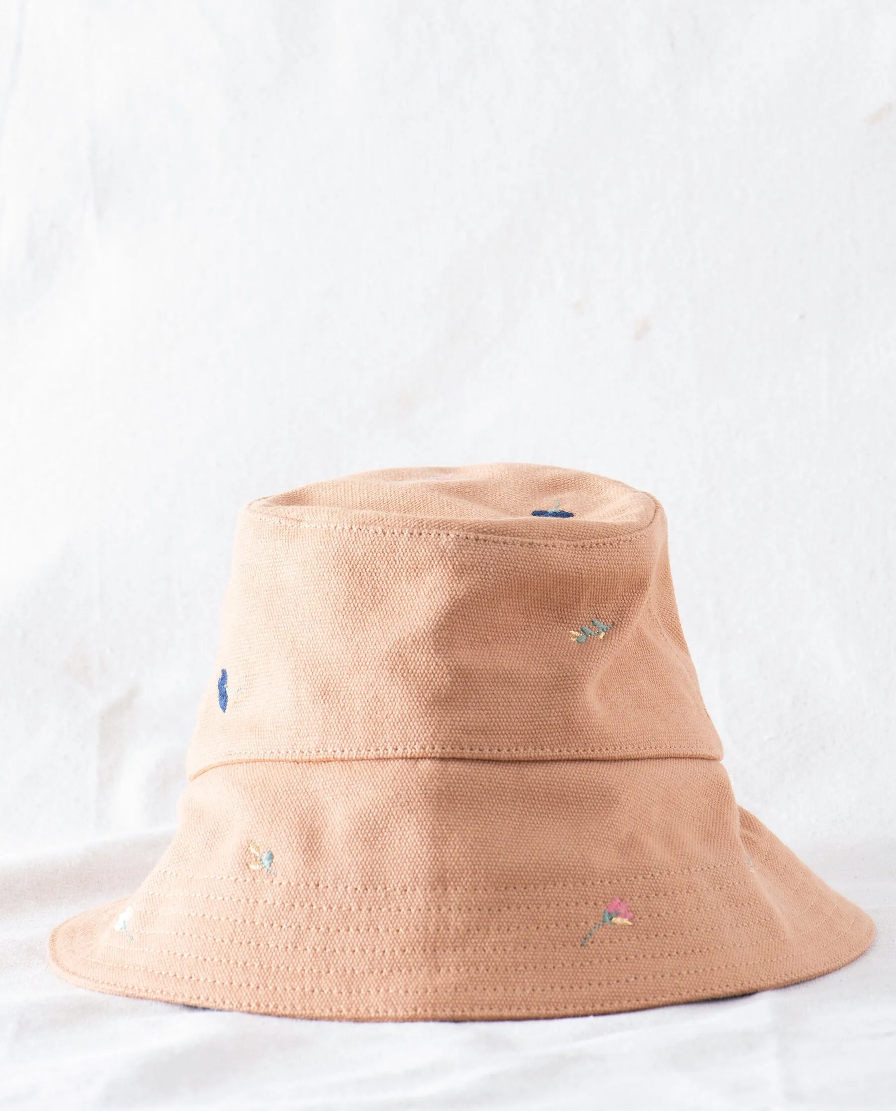 The Bucket Hat. -- Camel with Tossed Floral Embroidery