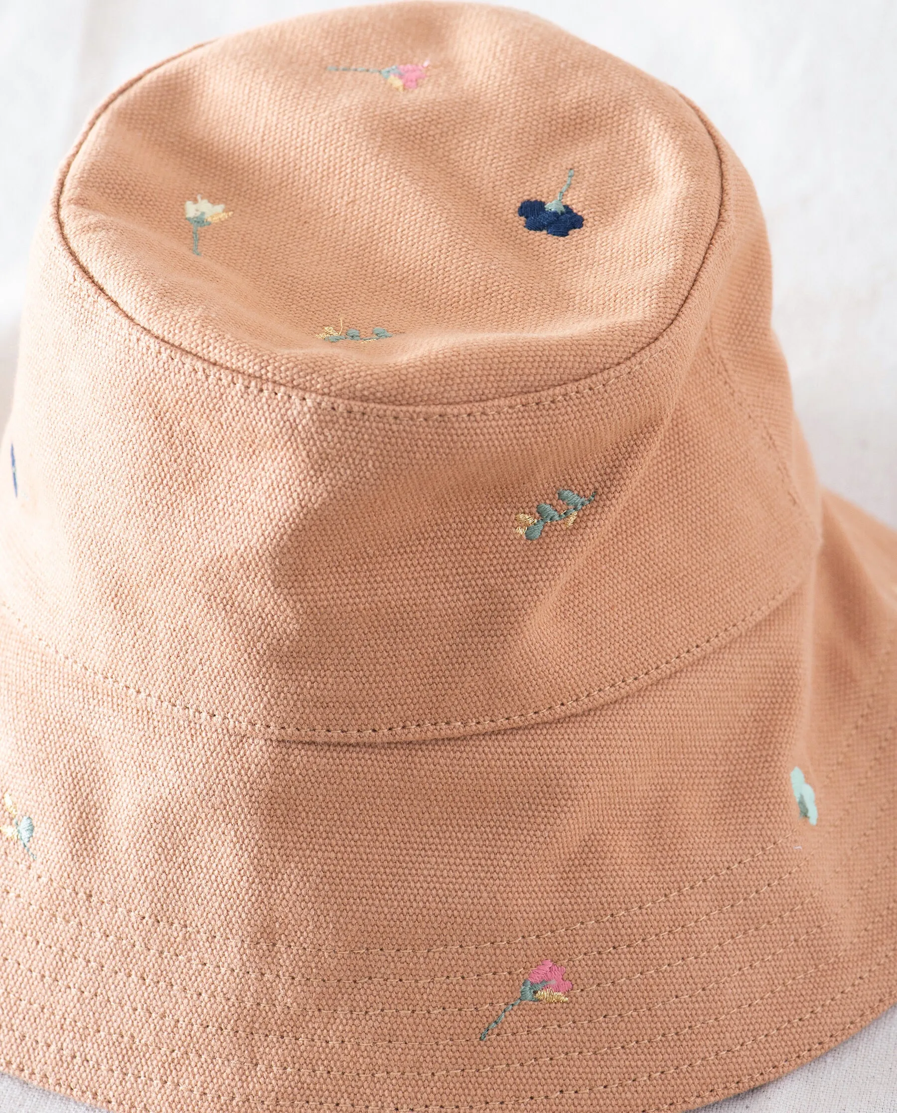 The Bucket Hat. -- Camel with Tossed Floral Embroidery